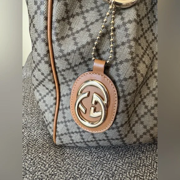 Designer-Style Brown Patterned Tote Bag with Tan Leather Trim - Picture 15 of 16